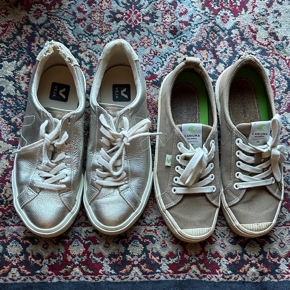 Cariuma khaki sneakers and VEJA metallic gold sneakers.
